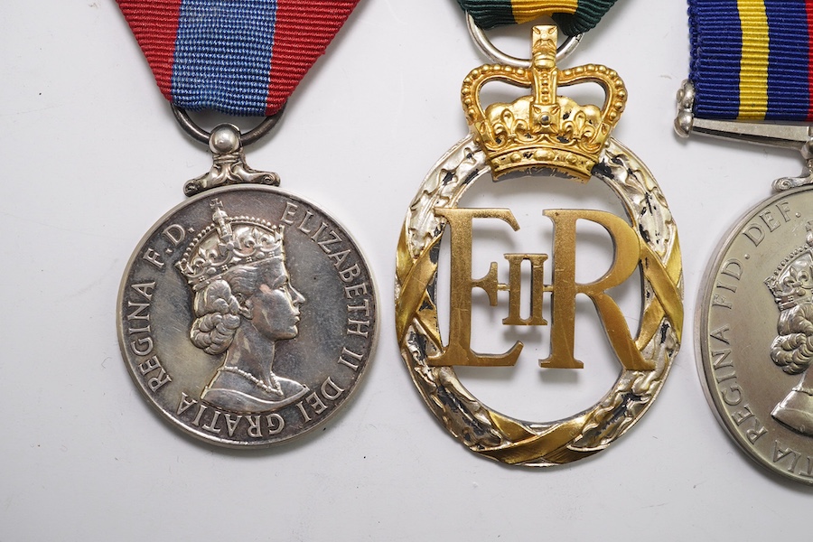 Four ERII service medals; Imperial Service medal to Alexander Manuel, another to Sydney John Jeffery (Technician Class IIA, Telecommunications Headquarters; Civil Defence Long Service unnamed; Territorial Efficiency Deco